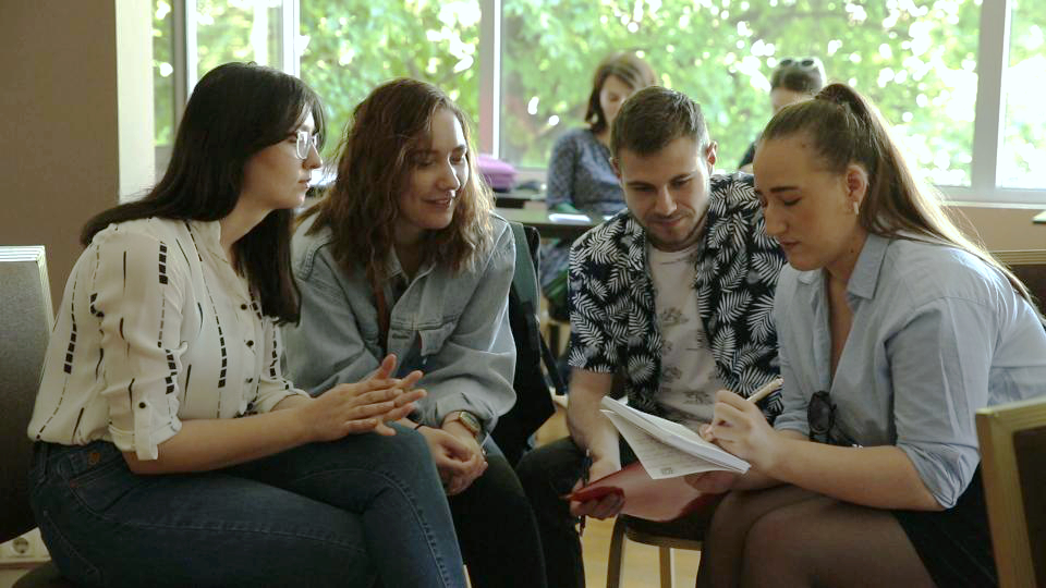 Young participants discussing hate speech at the media literacy training in Belgrade, May 2023