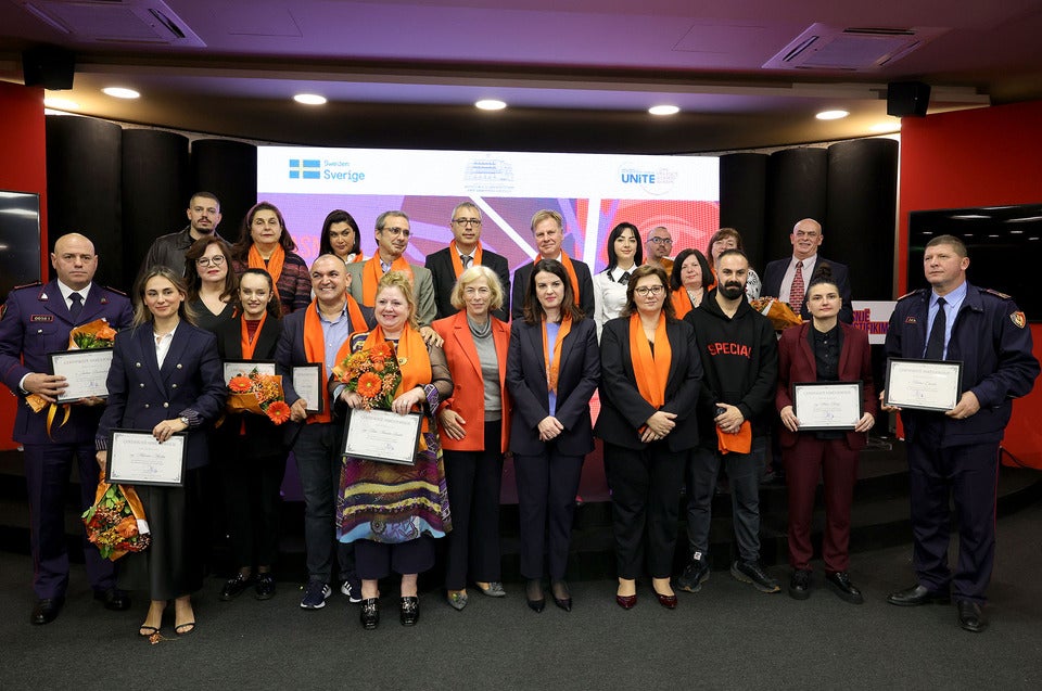 Activists, both women and men, from various  justice institutions and local support services who were honored for their contribution to and support for the prevention and elimination of violence against women and girls in Albania. Photo: UN Women Albania