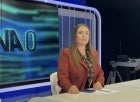 Anila Hoxha during a broadcast on Top Channel, an Albanian National TV station. Photo courtesy of her personal archive