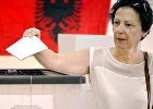 A woman voting on election day, 25 June 2017. Photo: UN Women/Violana Murataj